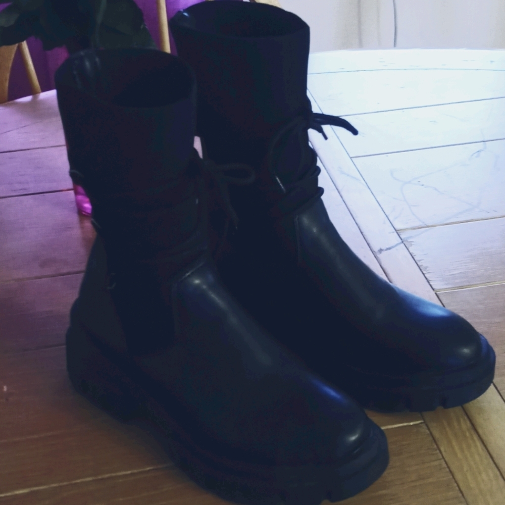 Black laced up boots